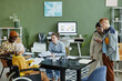 © Seventyfour - Portrait of diverse creative team working in office with young woman using wheelchair at business meeting