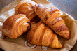 croissant and chocolate bread on a table