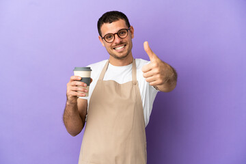 Brazilian restaurant waiter over isolated purple background with thumbs up because something good has happened