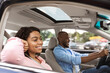 © Prostock-studio - Happy black couple enjoying drive on new car