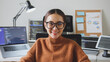 © Nattakorn - Portrait young Asian woman developer programmer, software engineer, IT support, wearing glasses look at camera and smile enjoy working at home.