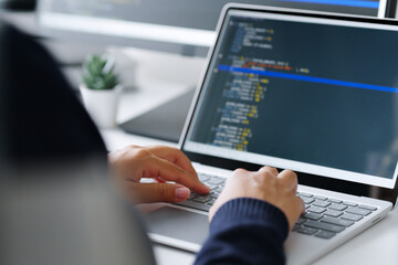 Closeup hand of developer programmer, soffware engineer, IT support, typing on computer keyboard