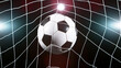 © Jag_cz - Soccer ball in goal, isolated on black background