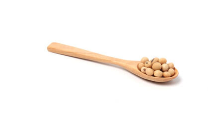 Wall Mural - soybeans in wooden spoon isolated on white background