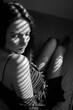 © AnettBudai - black and white portrait about a woman with playing light and shadow