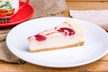 Sticker - strawberry cheesecake on a white plate macro close up