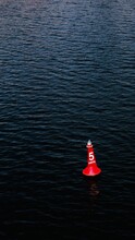 Red Buoy On The Water