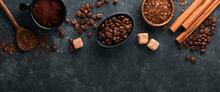 Coffee Beans Background. Roasted Coffee Concept With Differents Types Of Coffee, Beans And Cinnamon Sticks On Dark Black Stone Background. Top View. Coffee Concept. Mock Up.