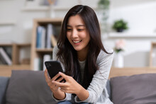 Happiness Entrepreneur Beautiful Business Asian Young Woman Wear Casual Use Mobile Phone For Shopping Online Enjoy With Social Media And Laptop At Home.Small Business Startup.online Banking
