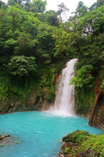 La Fortuna, Costa Rica, Majestic Blue Waterfall Rio Celeste In Rio Celeste National Park