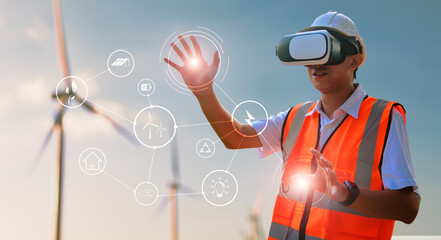 Wall Mural - Engineer wearing VR technology simulation control inspecting wind turbine power energy levels check up statistics with graphical icon control, eco environmentally friendly sustainable power resources