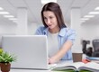 © BillionPhotos.com - Distance Education concept. Beautiful woman working on laptop. Webinar studying online at home looking at screen