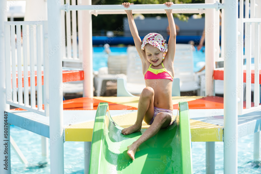 Swimming - little girl playing in blue water Stock Photo | Adobe Stock