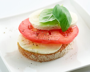 Canvas Print - bruschetta with tomato and mozzarella