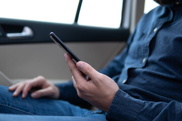 Poster - Hipster text message on smart phone or technology, mock up of blank screen. Man using cellphone on building castle background