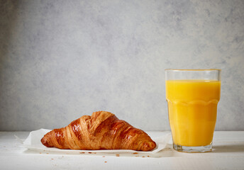 Canvas Print - freshly baked croissant and juice