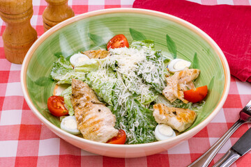 Wall Mural - Salad caesar with chicken on green plate