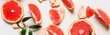 Pieces of fresh grapefruit on white background. Banner for design