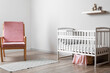© Pixel-Shot - Interior of modern children's room with comfortable crib