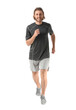 © Pixel-Shot - Sporty man running on white background