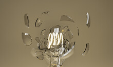 Light Bulb Exploding With The Filament Illuminated