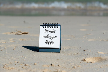 Wall Mural - Inspirational quotes - Do what makes you happy. Beach background.