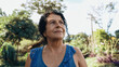 Smiling latin Brazilian woman in the farm. Joy, positive and love.