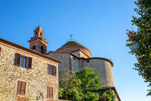 View Of Church Under Blue Sky On Sunny Day, Castiglione Del Lago, Umbria, Italy