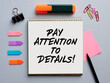 © Cagkan - The message pay attention to details written on a notebook on business office desktop.