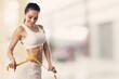 © BillionPhotos.com - Beautiful fit sporty girl in underwear with measuring tape at hips. Perfect woman body concept.