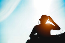 Silhouette Of Dj Mixing Outdoor During Summer Vacations At Sunset Time - Focus On Head