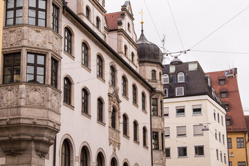 Munich, Germany - December 19 2021: Street view of the facade of the building in Munich downtown on Winter day.