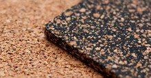 A Close-up Of A Rubberized And Rubberless Cork Plate With A Shallow Depth Of Field	