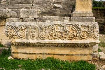 Wall Mural - Stone Theater masks in Myra Ancient City. Demre, Antalya, Turkey