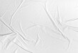 © Ton Photographer4289 - Blank white crumpled paper poster texture background. White paper wrinkled poster template, white paper sticker poster mockup on wall concept