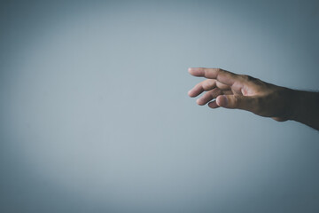 Wall Mural - man's hand concept The man is spreading his hands at the level of his chest. Suitable for making products, products or symbols to put together with pictures.