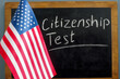 USA flag and the inscription citizenship test on the blackboard.