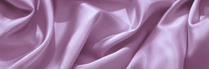 Wall Mural - Pink purple silk satin. Wavy folds. Silky shiny fabric. Elegant lilac background with space for design. Web banner. Website header. Panoramic.