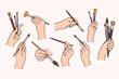 © drawlab19 - Set of person hands holding painting brushes. Collection of people artists or painter with artistic tools and equipment. Hobby and activity. Paintbrush. Flat vector illustration.