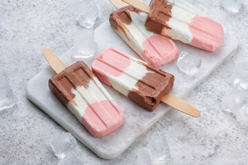 Wall Mural - Neapolitan yogurt ice cream popsicle