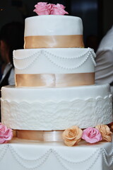 Wall Mural - wedding cake beautiful decorated with roses