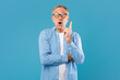 © Prostock-studio - Excited mature man has great idea and pointing finger up