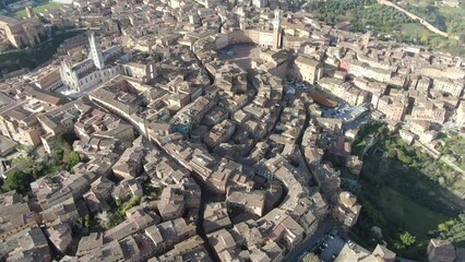 Wall Mural - Cinematic aerial footage of the historic city of Siena, in Tuscany, Italy