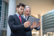 © Minerva Studio - Business people working on a tablet