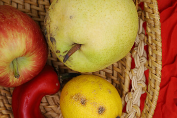 Wall Mural - various fruits in a wicker basket