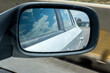 © Cristina - Retrovisor copiloto con reflejo de nubes