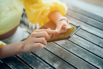 Wall Mural - Closeup woman hands touch screen on smart phone, marketing technology and business concept.