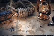 Exploration, Adventure And Treasure Hunting Concept. Vintage Map, Old Lamp, Chest, Pocket Watch On A Wooden Table. Columbus Day.