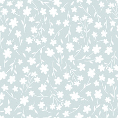 Wall Mural - Ditsy Flower hand drawn white on blue vector seamless pattern. Liberty inspired Petite floral ditsy print. Retro 60s 70s Bloomy calico background for fashion fabric or home textile.