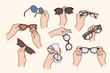 © drawlab19 - Collection of people holding various glasses for eyesight correction. Set of person hands with spectacles. Eyewear and opticians advertising. Flat vector illustration.